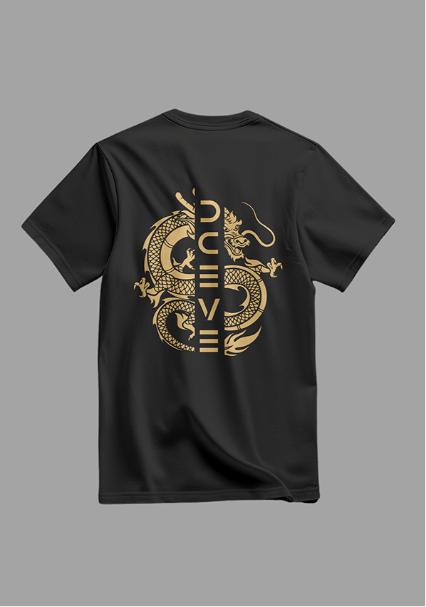 Black t-shirt with gold designs on a gray background