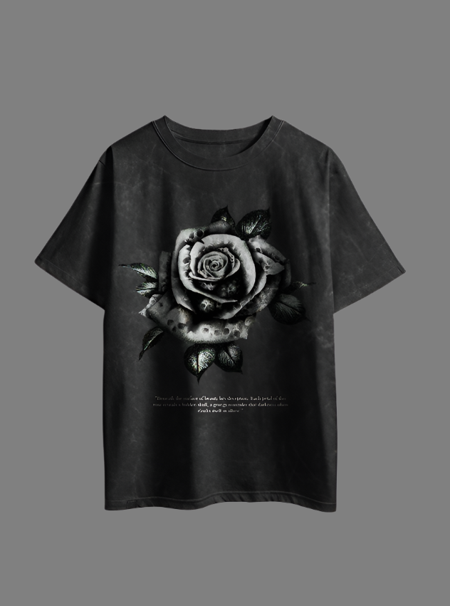 Black t-shirt with a floral design on the front and back, displayed against a white background.